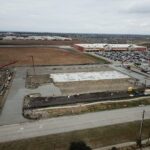 17,000 pier and beam foundation with formed beams and 36 belled piers. 63,000 square feet of paving. 3,000 square foot of colored stencil concrete sidewalk. 3,000 square feet of typical sidewalk