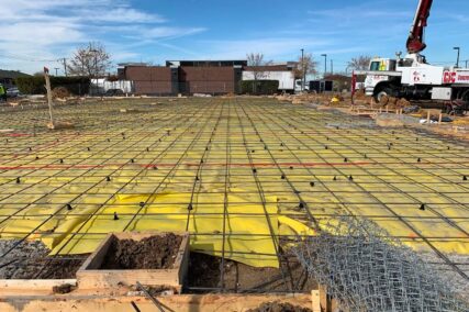 Retail concrete construction project with rebar ready to pour concrete paving